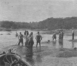 EN ROUTE TO THE GOLDFIELDS OF GUIANA. PASSING THE RAPIDS
OF THE ESSEQUEBO.