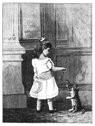 Girl playing with cat