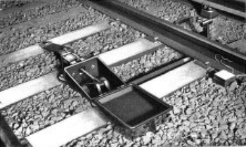 PNEUMATIC TRACK STOP, SHOWING STOP TRIGGER IN UPRIGHT
POSITION